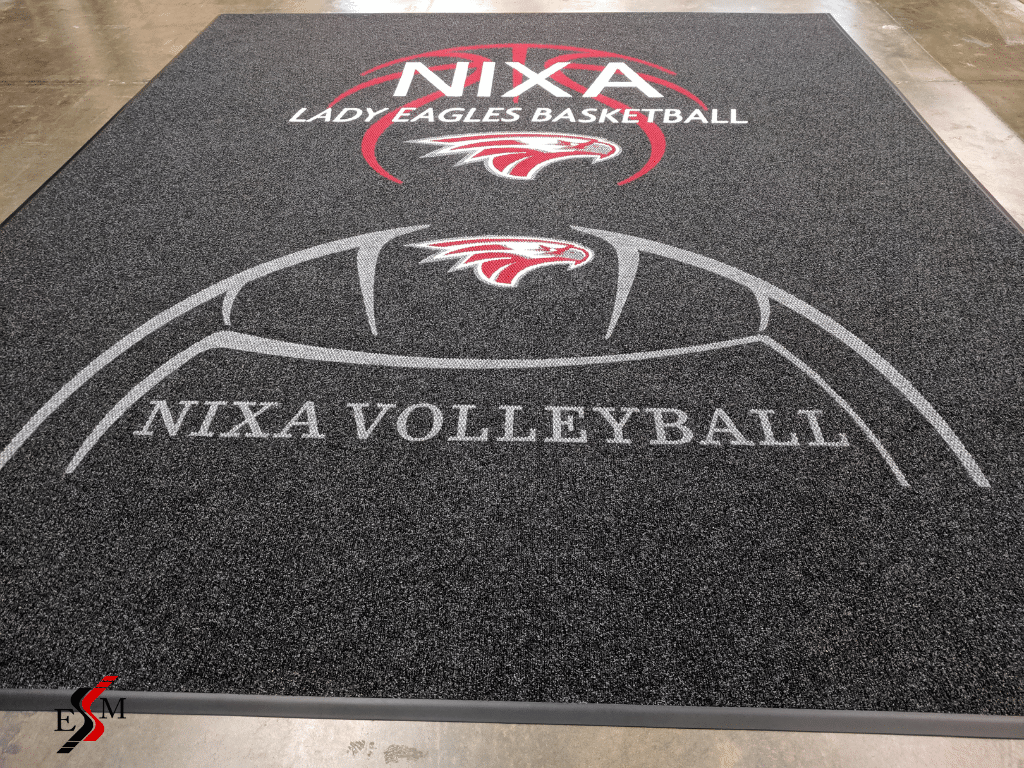 mats with logo for NIXA Lady Eagles Volleyball