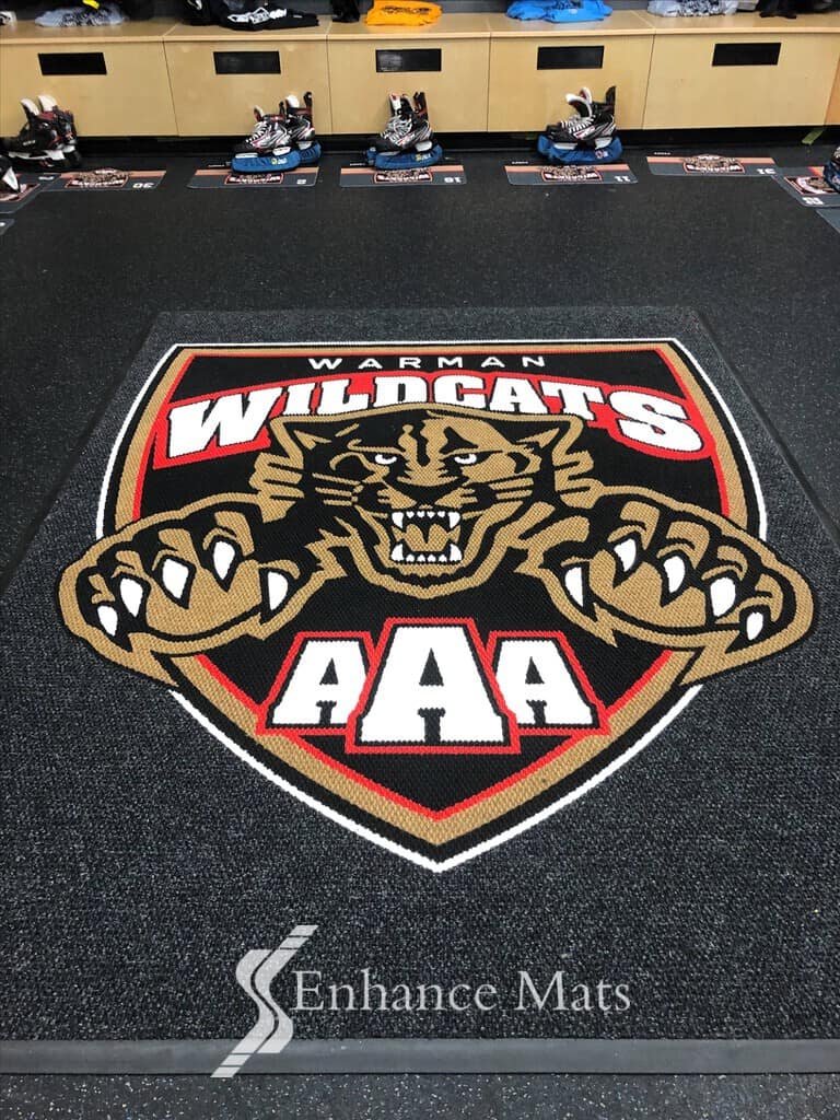Athletic mat with logo in locker room