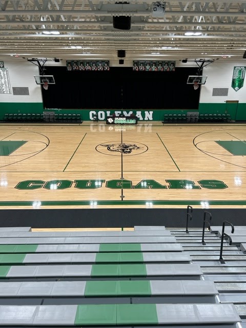 runner mats protect the gym floor at Coleman High School