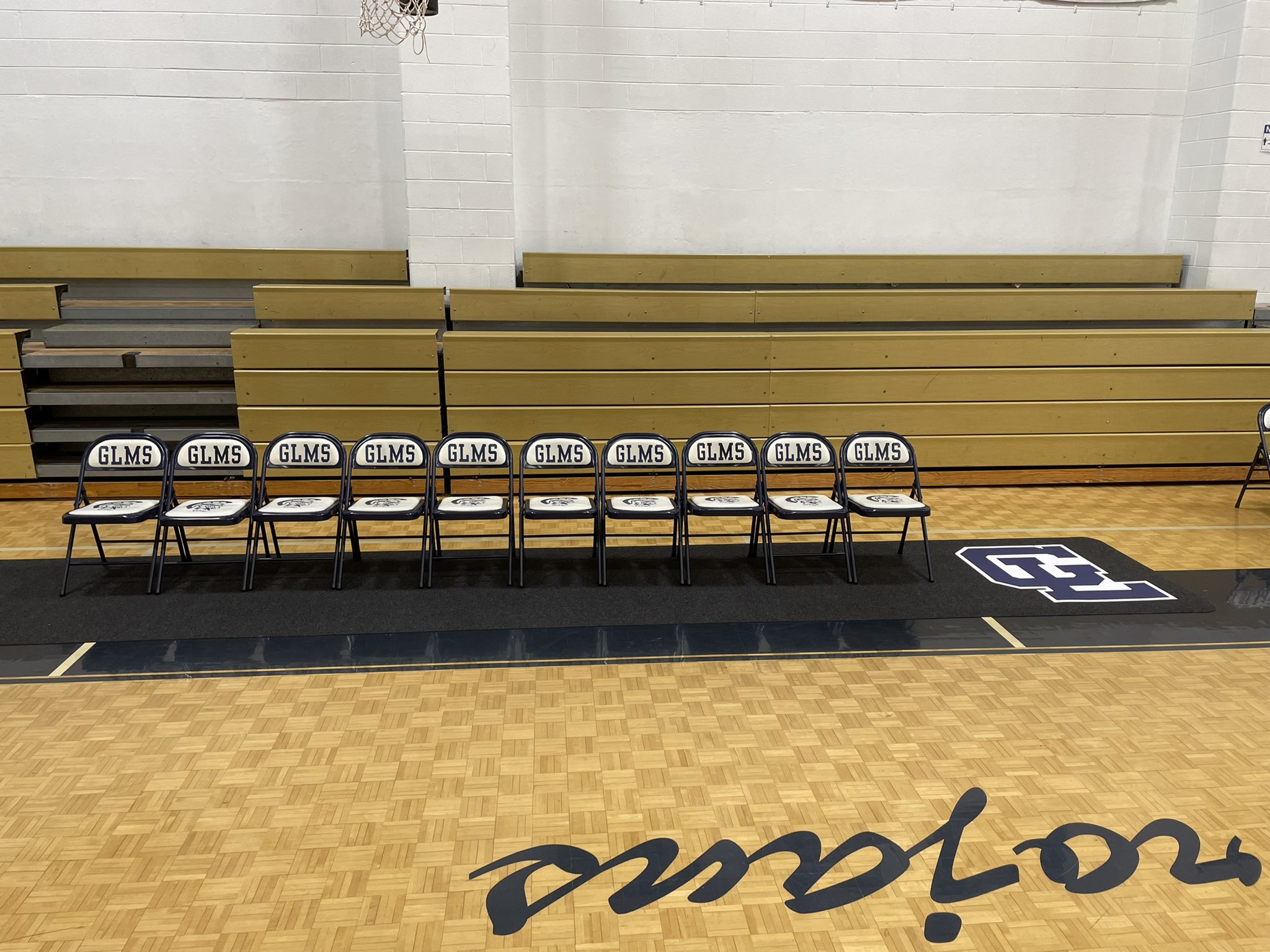 courtside runners for GLMS basketball team with brilliant logos