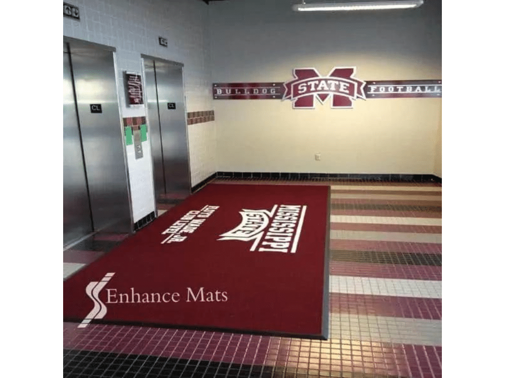 Personalized logo mat for Mississippi State University football team on Club Level