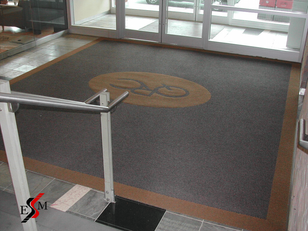 entrance mats with logo inside building
