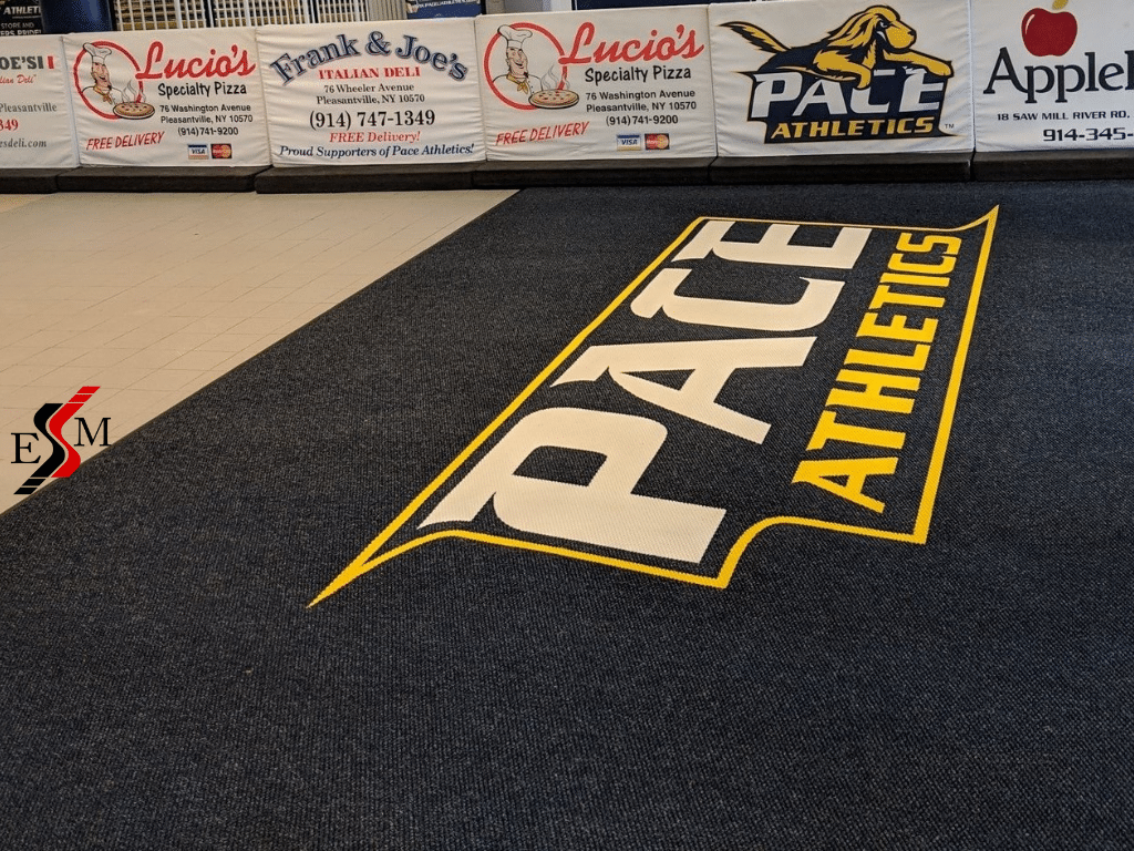custom rug with logo for Pace Athletics in gym