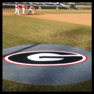 On deck circle in baseball field