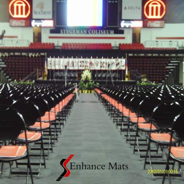 gym floor cover at Stegeman Coliseum protects floor during commencement