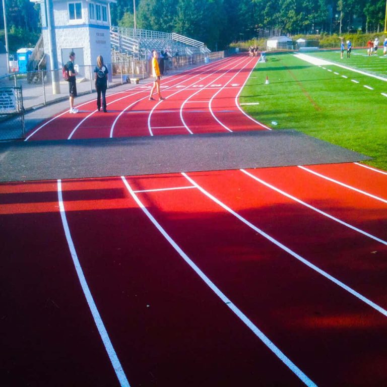 track covers protect track from players' cleats