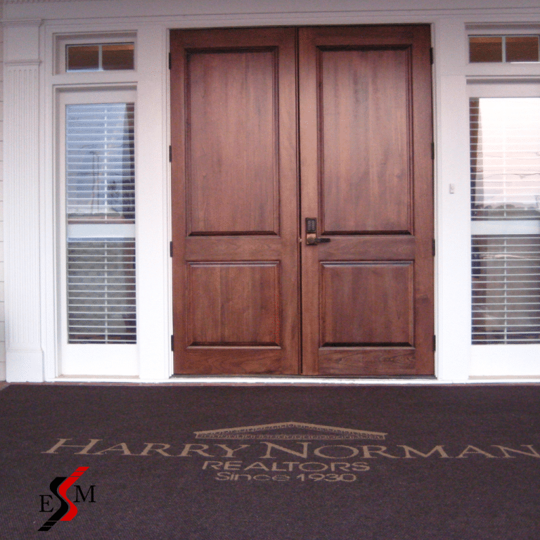 oversized entryway carpet with logo for Harry Norman Realtors